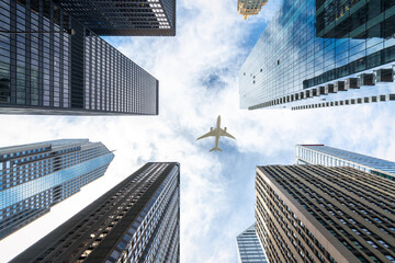 Airplane fly over building and city of Chicago city