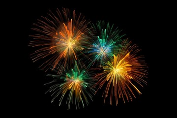 Fototapeta premium five multicolored fireworks on a black background