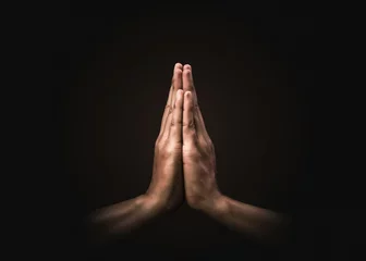 Photo sur Plexiglas Séoul Praying hands with faith in religion and belief in God on dark background. Power of hope or love and devotion. Namaste or Namaskar hands gesture. Prayer position.