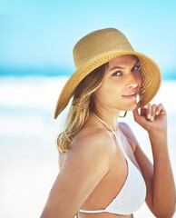 Happy, space and portrait of woman at beach for summer vacation, tropical and travel mockup. Wellness, nature and holiday with face of female tourist and hat at seaside for sunbathing and paradise
