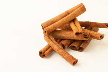 Cinnamon sticks isolated on white background.
