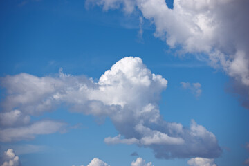 Heaven, space and environment with clouds in blue sky for nature, peace and climate. Sunshine, mockup and dream with fluffy cloudscape in ozone air for freedom, pattern and weather meteorology