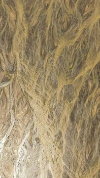 Drying riverbed during the dry season. Drought onset theme. Bucao river. Luzon, Philippines. Vertical video.