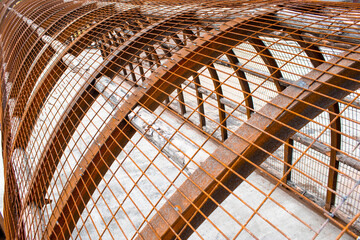 Tunnel made of bar iron. Building materials and construction preparation.