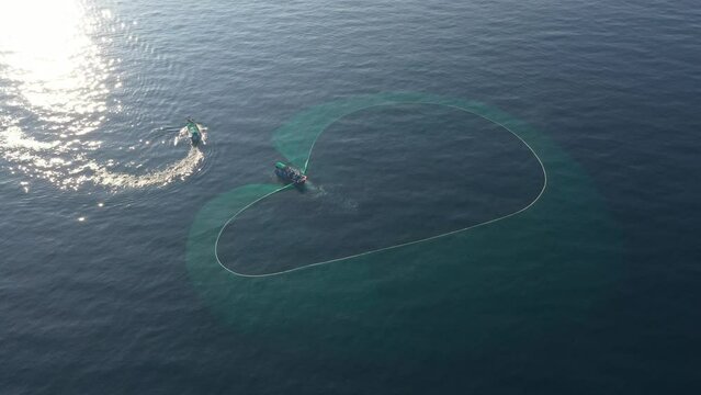 Crew of Fishermen Work on Commercial Fishing Ship that Pulls Trawl Net, Yen island, Phu Yen, Vietnam