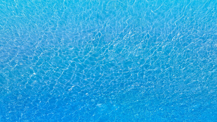 Aerial view of the Overhead view of crystal clear water on beach background