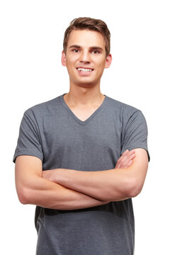 Style, crossed arms and portrait of man with smile in studio with confidence, attractive and pride on white background. Happy, fashion and face of isolated handsome male person with positive mindset