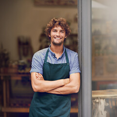 Retail, arms crossed and portrait of man at restaurant for small business, coffee shop and waiter....