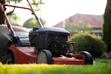 Lawn mover on green grass. Machine for cutting lawns.