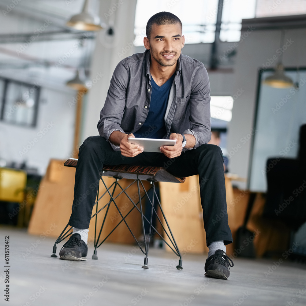 Poster tablet, thinking and a man designer sitting in his for a creative idea or inspiration while searchin
