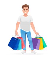 A handsome young guy stands with multi-colored paper bags from shopping. Happy man with packages goes shopping.