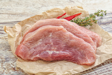 Raw pork schnitzel for roast