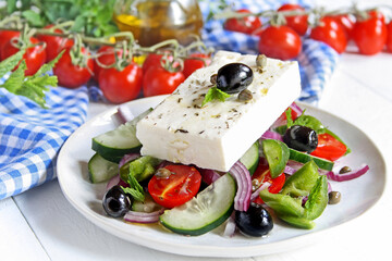 Traditional Greek salad (Horiatiki) with feta cheese and vegetables