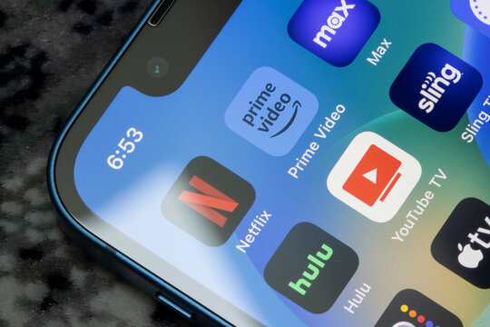 Portland, OR, USA - Jun 9, 2023: Assorted video streaming apps are seen on an iPhone, including Netflix, Prime Video, Max, Hulu, YouTube TV, and Sling TV.