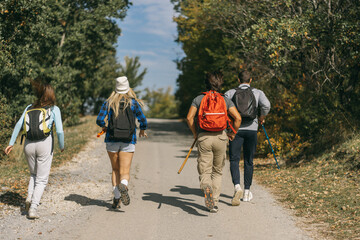 Friends walking at the road
