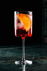 alcoholic cocktail in a glass stands on a table in a bar or restaurant