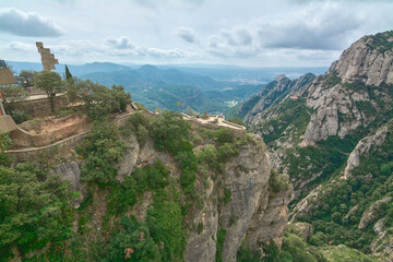 Fototapeta na wymiar Partial view of the mountains from the abbey of Santa Maria de Montserrat in Monistrol.