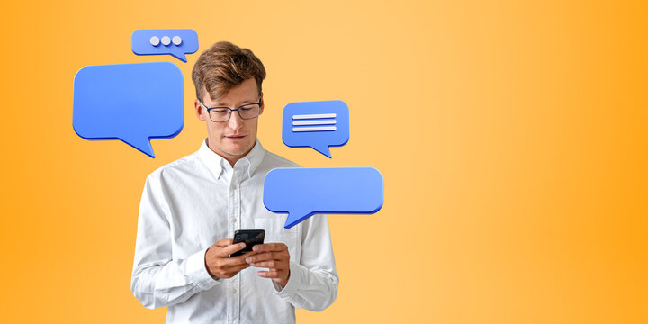 Smiling European businessman with smartphone and speech bubbles