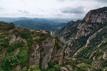 Fototapeta na wymiar Partial view of the mountains from the abbey of Santa Maria de Montserrat in Monistrol.