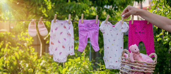 washing baby clothes. Linen dries in the fresh air. Selective focus.
