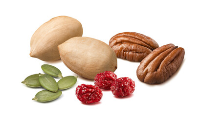 Brazil nuts in shells, pecan, pumpkin seeds and cranberries isolated on white background. Nuts and berries mix