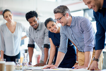 Team, creative and staff in a meeting, cooperation and planning with ideas, discussion and...