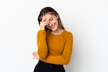 Young caucasian woman isolated on white background laughing