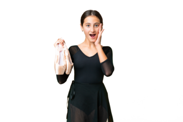 Young woman practicing ballet over isolated chroma key background with surprise and shocked facial expression