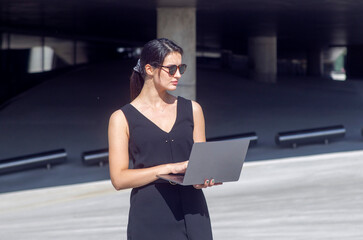 Business woman work on laptop computer at outdoor