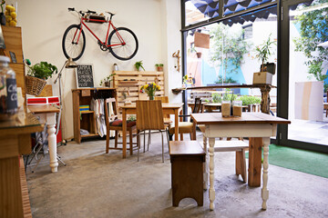 Coffee shop, empty interior and space with table, chairs and furniture or small business, bistro...
