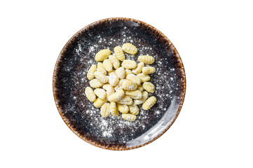 Italian gnocchi dumplings,  Raw potato gnocchi on plate with thyme.  Isolated, transparent background