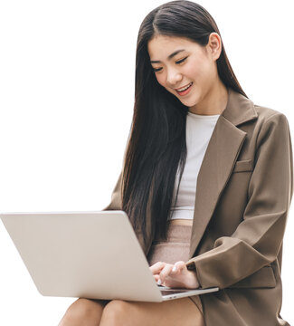Young business asian woman using laptop computer typing keyboard isolated transparent background