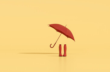 Red umbrella with rubber boots for rain and umbrella over yellow background © Tiviland