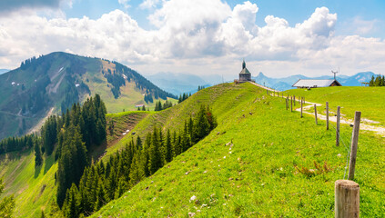 Chapel Heilig Kreuz. View from the Wallberg mountain in the German Alps. Panorama