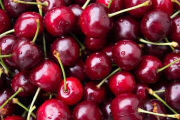 Background photo. Fresh ripe juicy tasty sweet cherry. Red berry for making juice, jam, compote. Concept of harvesting from garden, buying farm food, farming support, veggie. Shop of vegetable. Fruit