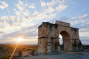 Beautiful sunset landscape. The ancient antique roman city Volubilis in Morocco, Africa.