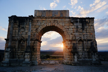 Beautiful sunset landscape. The ancient antique roman city Volubilis in Morocco, Africa.