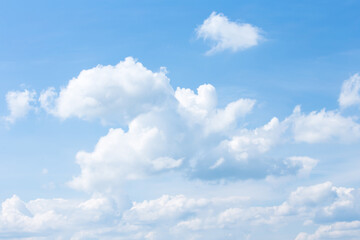 Naklejka na ściany i meble white clouds in blue sky on day noon light.