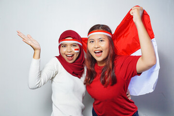 happiness of a group of young people using the red and white attributes to commemorate independence day