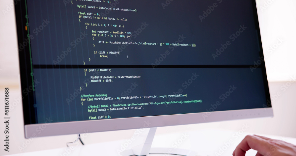 Fototapete Computer Programmer Writing Program Code On Computer