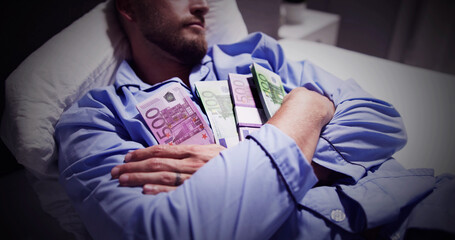 Man Sleeping On Bed With Bundle