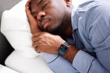 Man Sleeping With Smart Watch