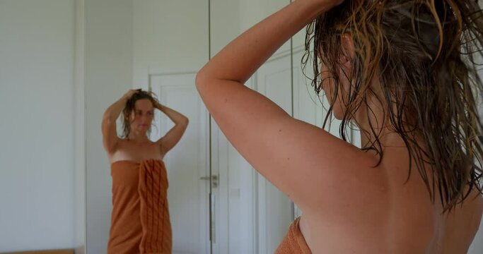 Close Up Woman In Towel Standing In Bedroom Touch Brown Hair, Haircare Concept