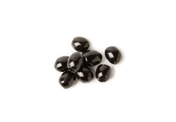 Black olives isolated on white background. Olive tree leaves. Vegan. Ingredient for salad or pizza.