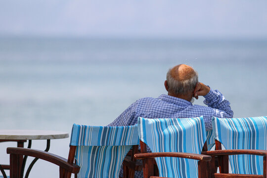 Grandpa looking at the sea