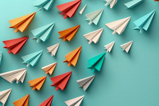 Creative layout made with Colorful background pattern made with paper airplanes on sky blue background. Minimal back to school concept. 