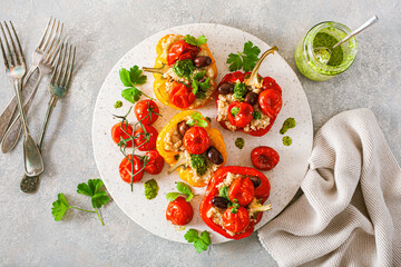 stuffed bell peppers with quinoa tomatoes olives and herb sauce chimichurri