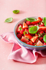 watermelon salad with strawberry raspberry basil seeds. healthy summer dessert