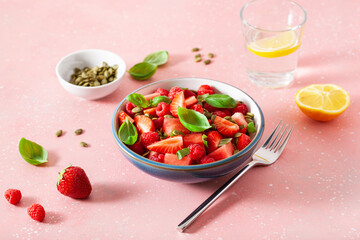 watermelon salad with strawberry raspberry basil seeds. healthy summer dessert