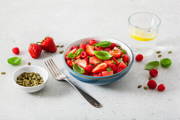 watermelon salad with strawberry raspberry basil seeds. healthy summer dessert